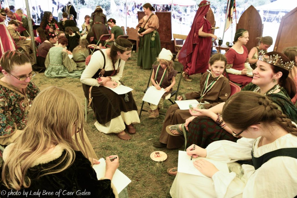 A group of people drawing together