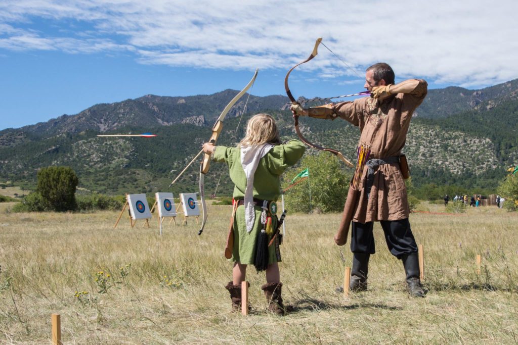 Two people shooting archery. Photo by Bree Pye.