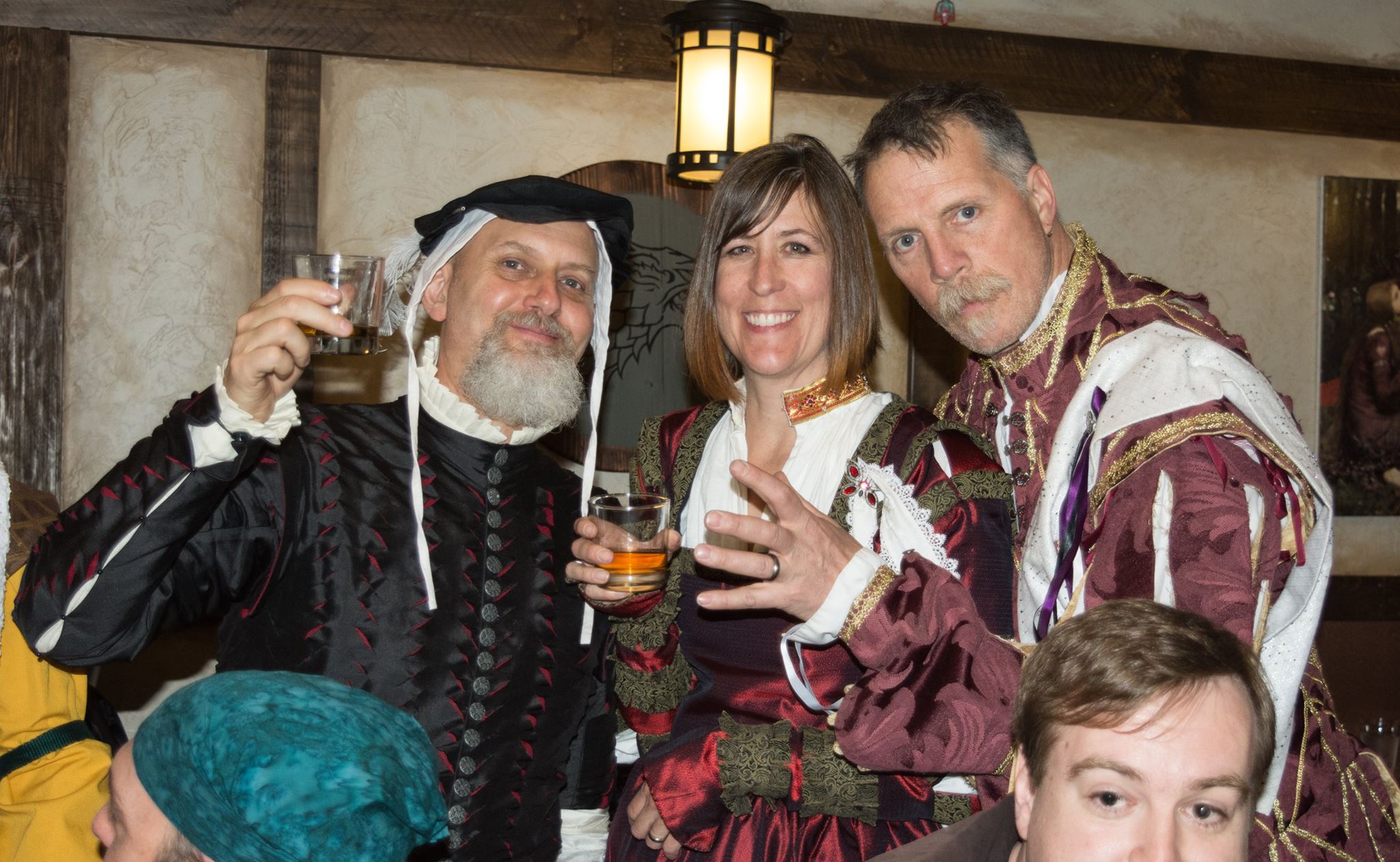 Three people toasting